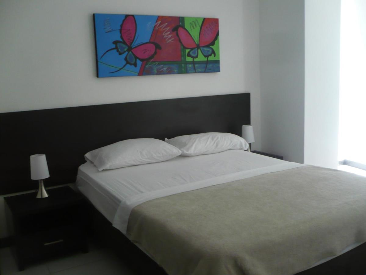 Apartasuites San Marcos Кали Номер фото