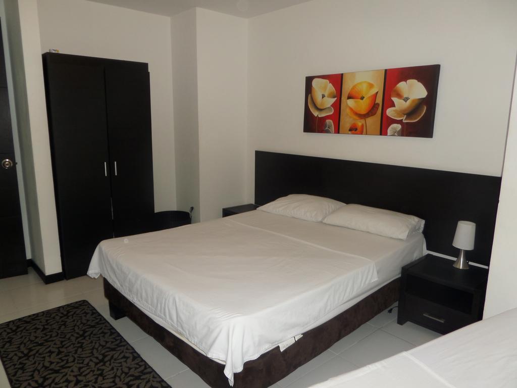 Apartasuites San Marcos Кали Номер фото