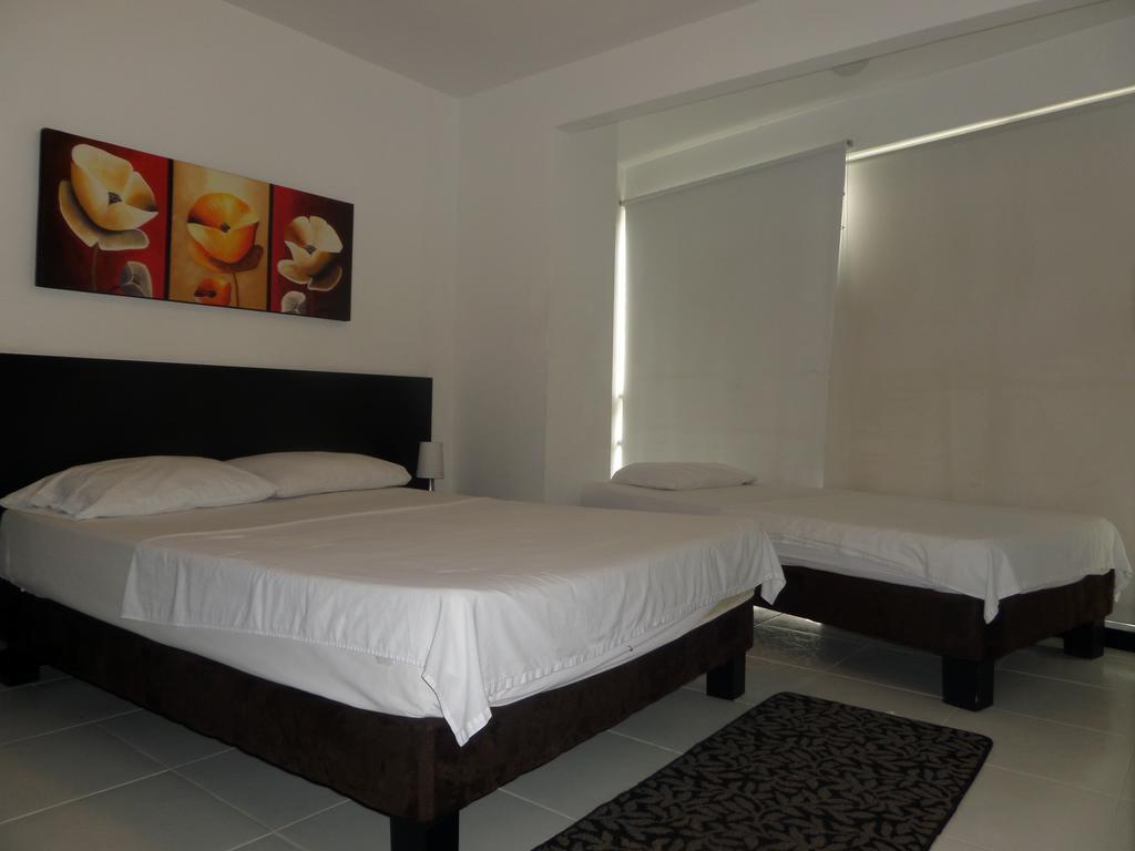Apartasuites San Marcos Кали Номер фото