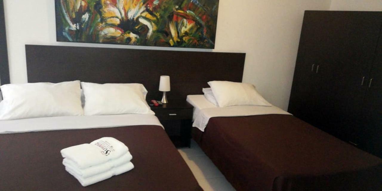 Apartasuites San Marcos Кали Экстерьер фото