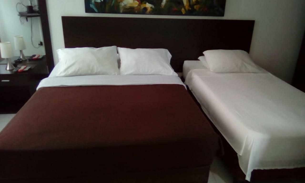 Apartasuites San Marcos Кали Экстерьер фото